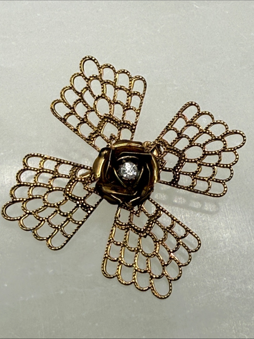 Gold Filigree Floral Brooch with Clear Crystal Center